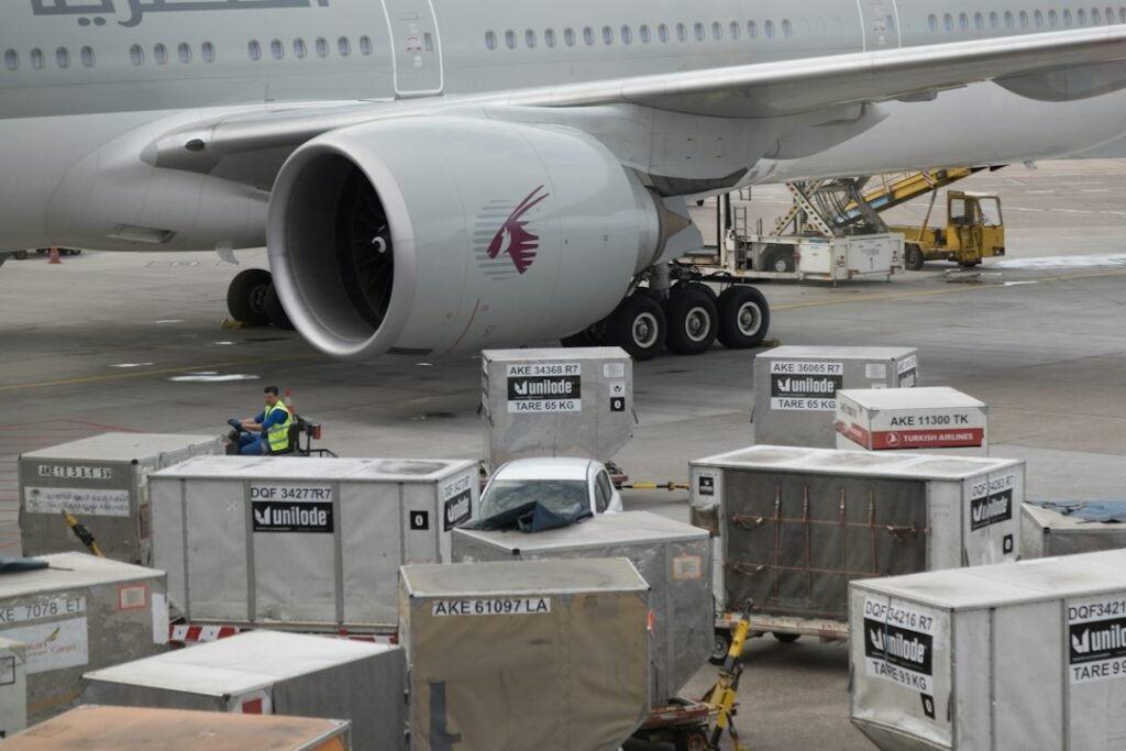 Cargo aircraft being loaded at an airport