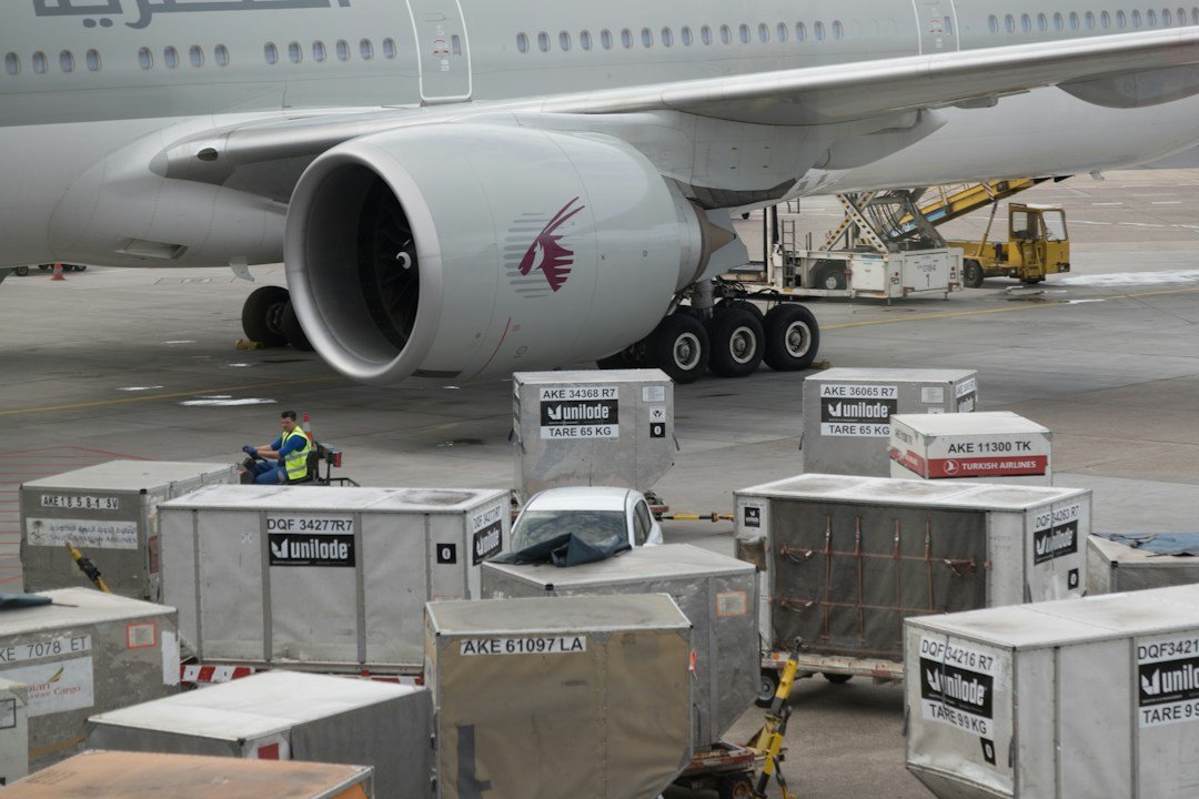 Cargo aircraft being loaded at an airport