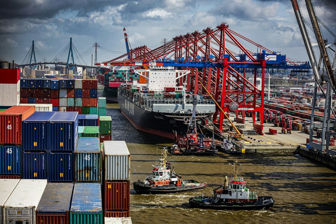 Cargo ship and containers at a busy port